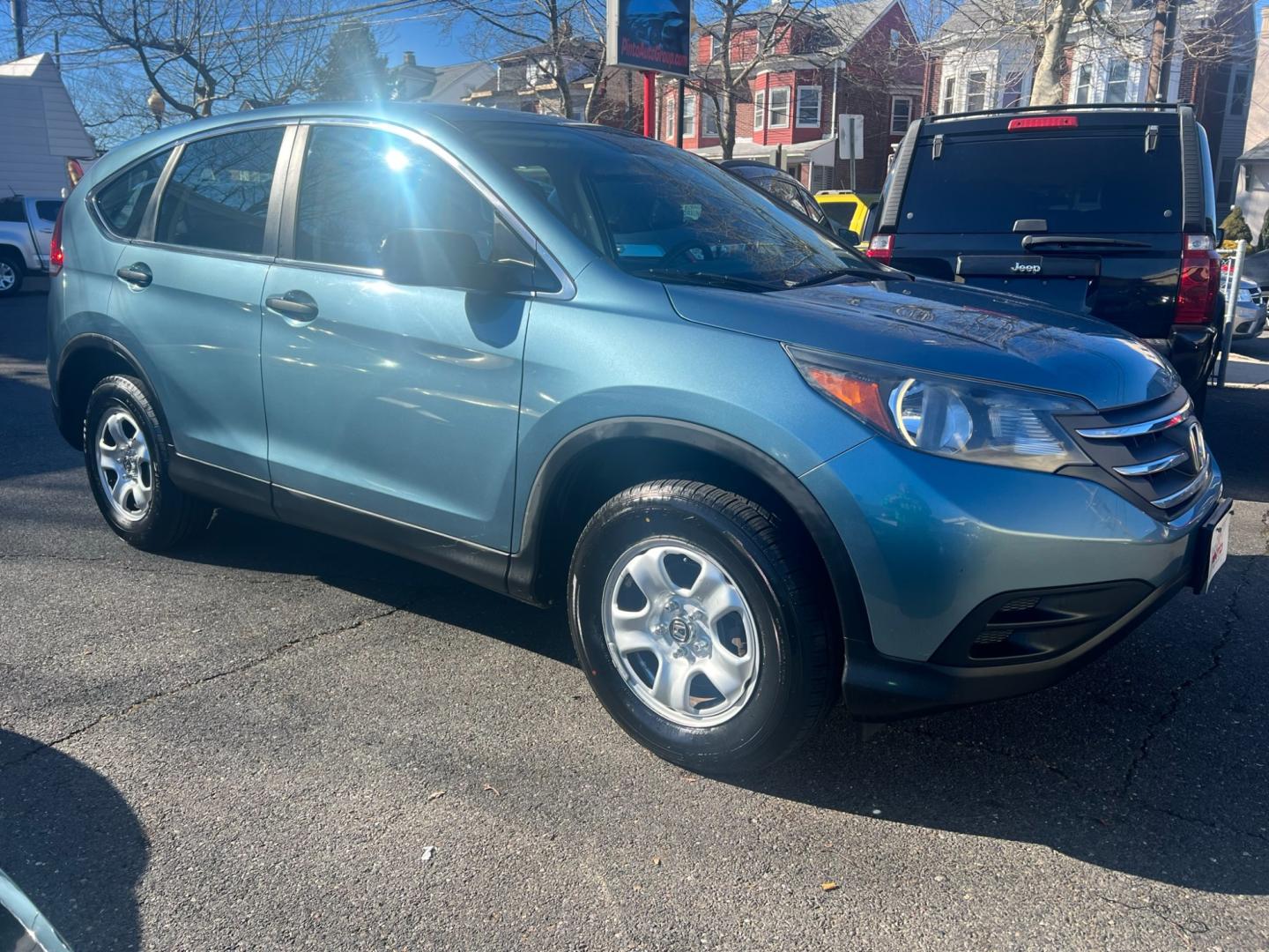 2013 Teal /Gray Honda CR-V LX 4WD 5 Speed AT (5J6RM4H33DL) with an 2.4L L4 DOHC 16V engine, 5 Speed Automatic transmission, located at 1018 Brunswick Ave, Trenton, NJ, 08638, (609) 989-0900, 40.240086, -74.748085 - Photo#6